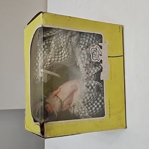 Mattel 1976 Rosebud Pink Heather Rose and cradel.